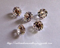 5 diamonds dispersing sunlight rays