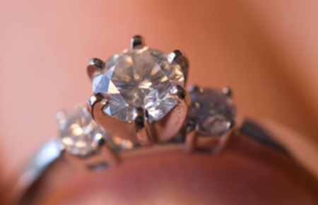 3 stone ring with 6 prongs
