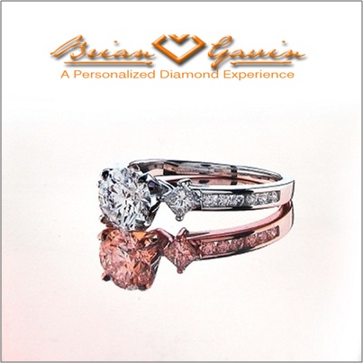 Stylish Ring With Channel Set Rounds & Princess Cut Sidestones 