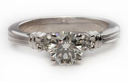 grooved setting with channel set round diamonds
