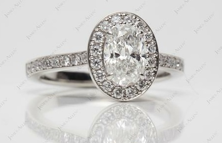 halo set oval diamond with pave diamonds