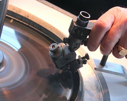 rough diamond on polishing wheel