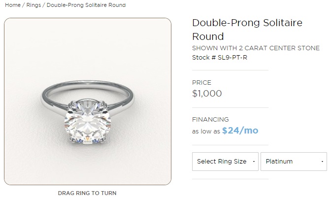 double prong solitaire round setting in platinum