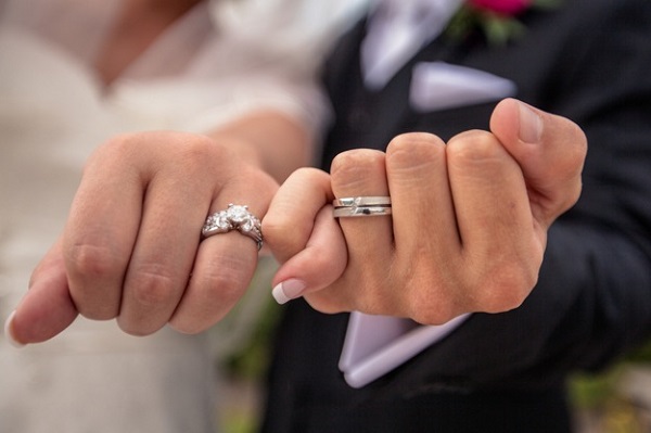 bride and groom wedding rings