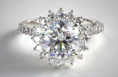 flower petal diamonds on the edge of ring resembling engagement