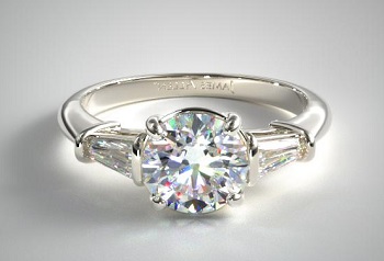 3 stone ring with 2ct round cut diamond