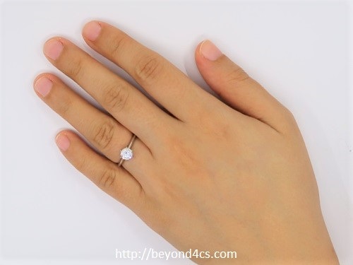 diamond on hand size 0.70 carat size 7 white gold ring - wife