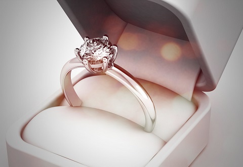 6 prong engagement ring in warm lighting