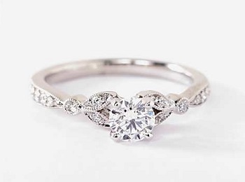 petite vintage style diamond ring with leaf motifs for small size hands