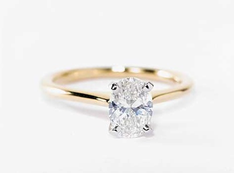 oval diamond yellow gold engagement ring