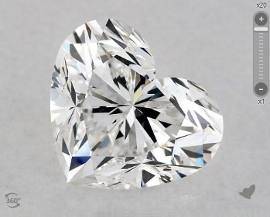 one half carat heart shaped diamond very very slightly included 2