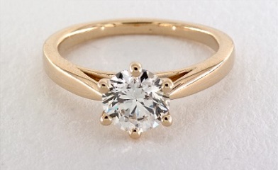 18k yellow gold setting with 1 ct near colorless diamond