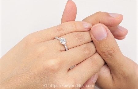 pave engagement ring worn on finger 0 60 carat size finger US 4