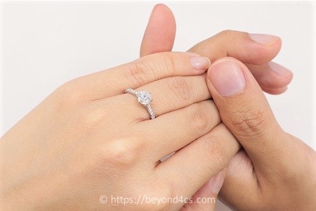 pave engagement ring worn on finger 0 60 carat size finger US 4