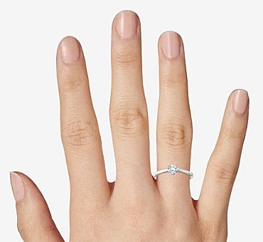 0.50ct half carat diamond ring on finger size seven