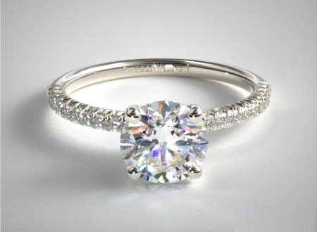 rounded prong setting with pave melee diamonds