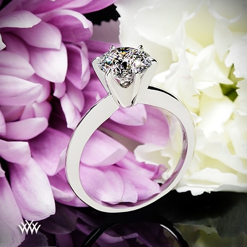 12 000 engagement ring with 1 5 carat round brilliant cut diamond