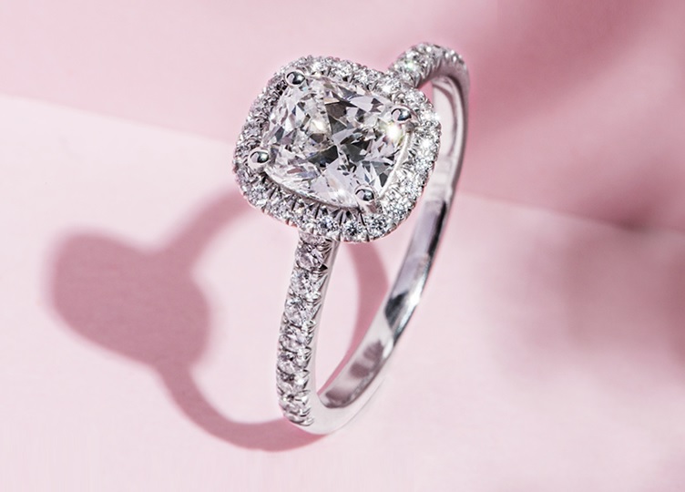 rectangular halo cushion engagement ring with diamond center stone