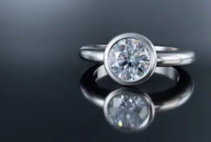 round full bezel engagement ring in platinum