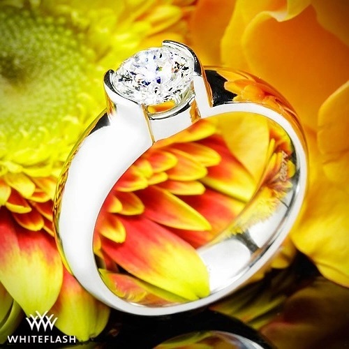semi bezel engagement ring with diamond center stone