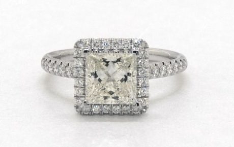 k color diamond in engagement ring setting with gh melees