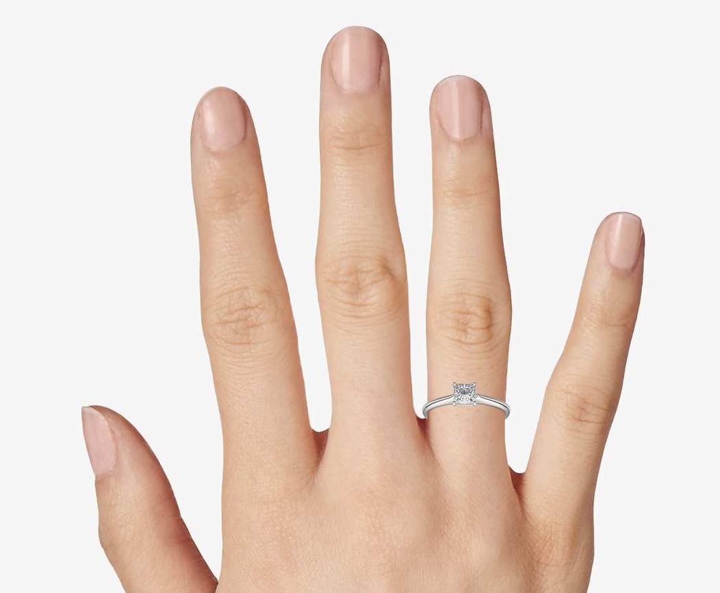 how big is a half carat princess cut diamond ring on finger