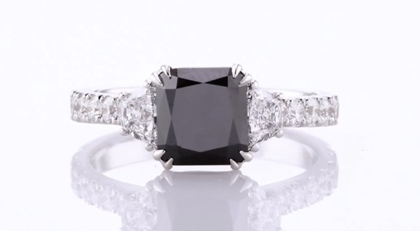 square cut black diamond ring with sidestones